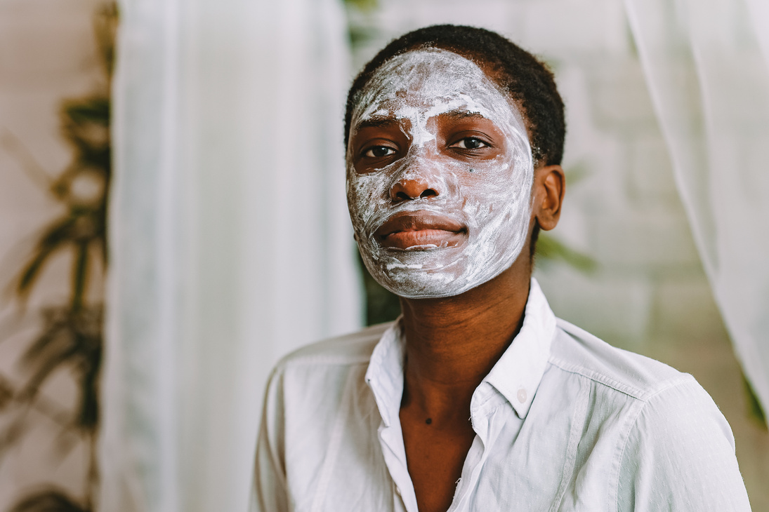 A Woman with a Bleaching Cream on Face